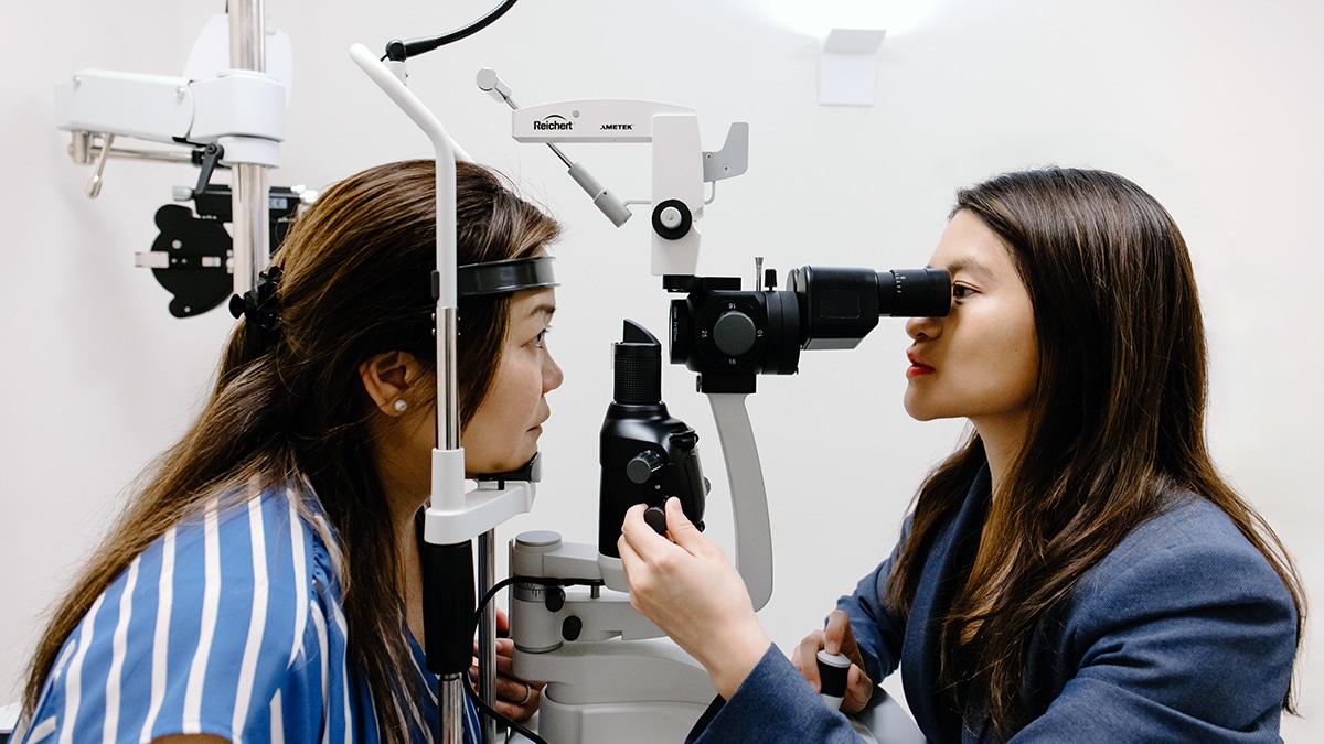 Dr. Zhou Performing an Eye Exam on a Patient